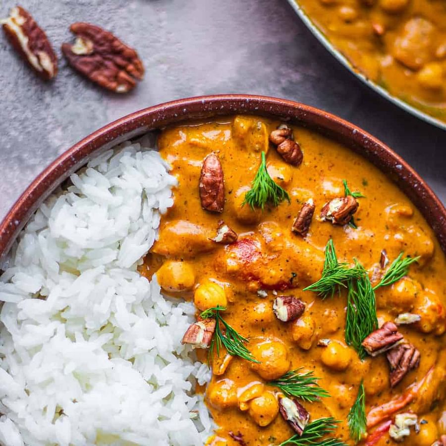 Delicious creamy vegan butter vegetable curry served with rice