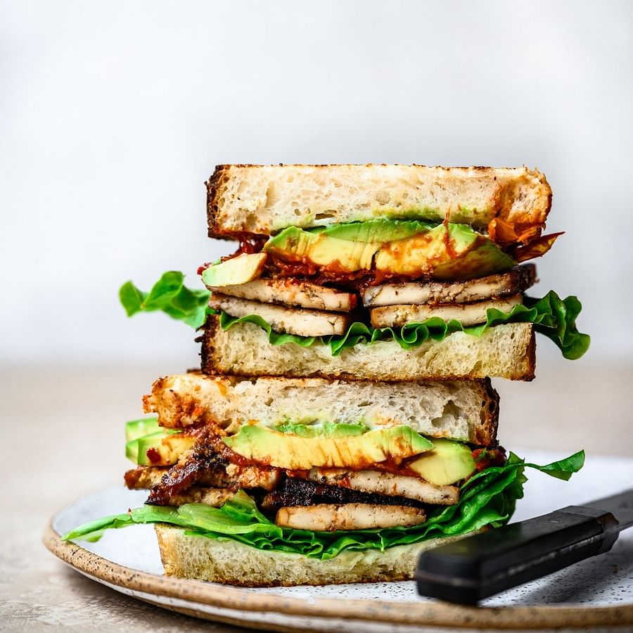 Delicious Vegan Avocado BLT Sandwich on a Plate